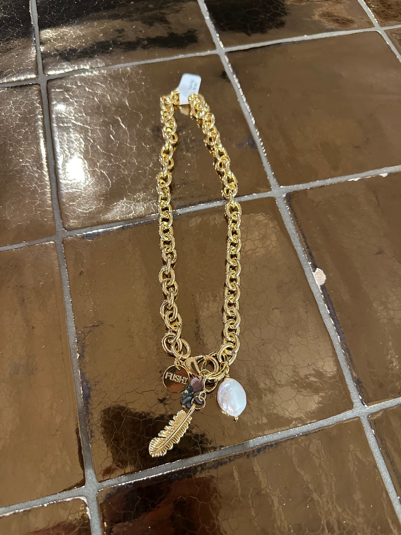 Ketting metaal met parel en veer