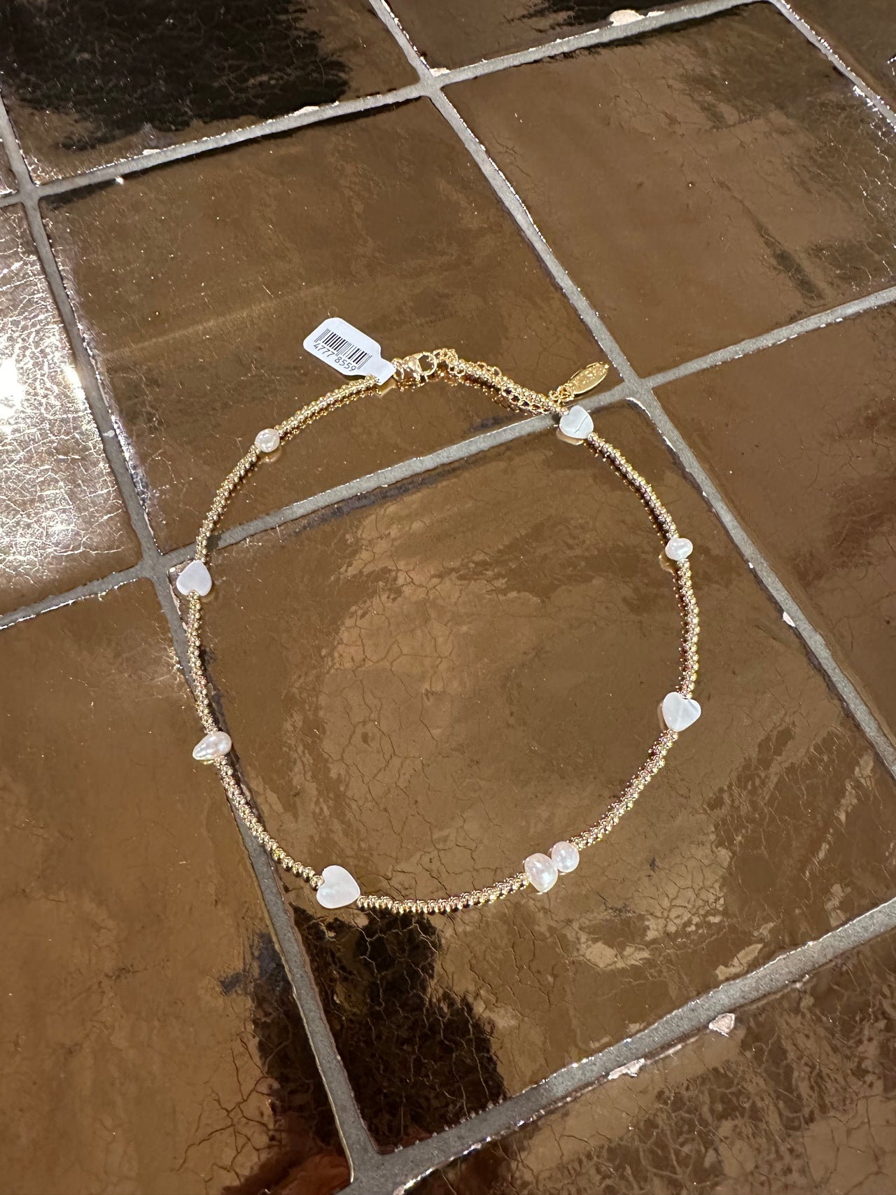 Fushi ketting meteen hartjes parel